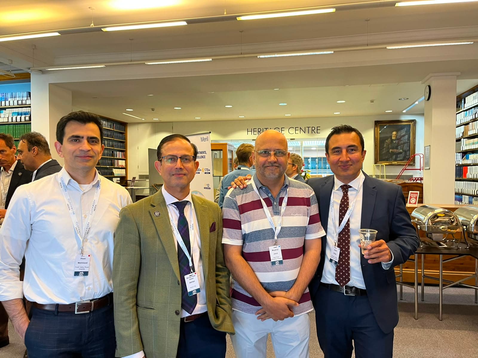 Dr Mujahid Jamil Khattak with fellow delegates in the Heritage Centre during a networking break at the Computer Assisted Orthopaedic Surgery Meeting 2026 in London